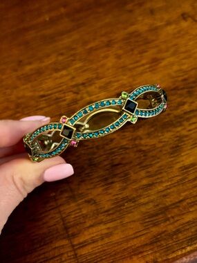 Heidi Daus Gold-Tone Infinity Bracelet with Teal and Pink Accents
